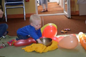 toddler enjoying Signs and Sounds