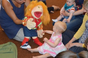 parents and babies doing British Sign Language